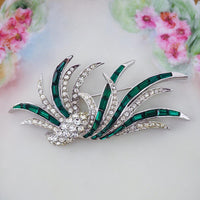 Boucher emerald green rhinestone brooch