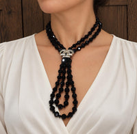 Vintage Boucher Black Glass Bead Necklace With Sparkling Rhinestone Centerpiece Multi Strand Designer Costume Jewelry